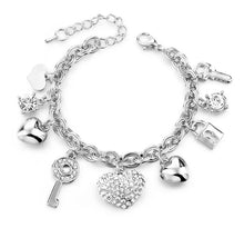Load image into Gallery viewer, Armed and Charmed Bracelet
